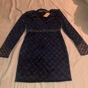 I bought this dress for New Year’s Eve never worn.